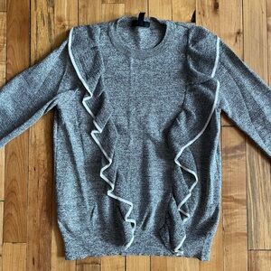 Long sleeved sweater with ruffles